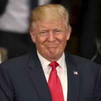 Presidential candidate Donald Trump smiles after outlining his economic plans at the Economic Club of New York on Thursday. How Trump could wipe $420 billion off China's exports