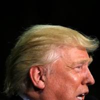 Republican U.S. presidential nominee Donald Trump holds a rally in Kenansville, North Carolina, on Tuesday. Trump used charity funds to pay legal settlements: report