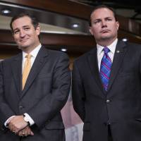 Sen. Mike Lee (right) stands next to Sen. Ted Cruz during a news conference on Capitol Hill in September 2013. Trump reveals 'definitive' Supreme Court wish list