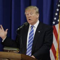 Republican presidential candidate Donald Trump speaks at the Polish National Alliance Wednesday in Chicago. Trump's ambiguous answer to a debate question on nuclear restraint raised doubts about his understanding of the issue. Trump ambiguity on nuclear restraint suggests he doesn't grasp the issue