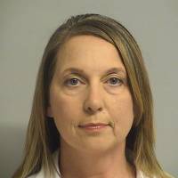 Police officer Betty Shelby, 42, who was charged with first-degree manslaughter in the death of 40-year-old Terence Crutcher, is shown in this Tulsa County Jail booking photo in Tulsa, Oklahoma, on Friday. Tulsa officer in fatal shooting of unarmed black man was late to career, had de-escalation training
