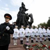 Kiev Cadets honor guard takes part in commemorative events at the Babi Yar ravine where Nazi troops machine-gunned tens of thousands of Jews during WWII, in Kiev Thursday. Ukraine commemorated the 75th anniversary of the 1941 Babi Yar massacre. Ukraine marks infamous Babi Yar massacre of 34,000 Jews on 75th anniversary