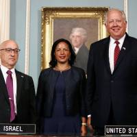 U.S. National Security Advisor Susan Rice greets Israeli Acting National Security Advisor Jacob Nagel and Undersecretary of State Tom Shannon after their signing ceremony for a new 10-year pact on security assistance between the two nations at the State Department in Washington Wednesday. U.S. inks biggest military aid deal ever, pledging $38 billion worth to Israel