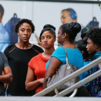 Family members of Keith Scott assemble near a press conference, held after protests over the police shooting of Scott, in Charlotte, North Carolina, Thursday. Kin of Charlotte black man killed by cops view body cam video, say questions remain
