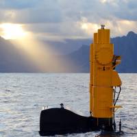 An Azura wave energy device converts the movement of waves into electricity at the U.S. Navy's Wave Energy Test Site at the Marine Corps base at Kaneohe Bay on Oahu in Hawaii. America's first wave-produced energy goes online in Hawaii
