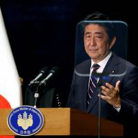 Prime Minister Shinzo Abe attends a news conference during the G-20 Summit in Hangzhou, Zhejiang Province, China, Monday. Abe, Xi agree to speed up talks on establishing East China Sea maritime hotline