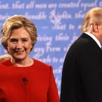 Democratic nominee Hillary Clinton and Republican nominee Donald Trump leave the stage after the first presidential debate at Hofstra University in Hempstead, New York, on Monday. In first debate, Clinton rips Trump over Japan comments, reassures nervous Asian allies