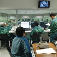 Tepco workers take part in an emergency response drill at the Kashiwazaki-Kariwa plant in Niigata Prefecture. Tepco keeps thousands on the clock at idled Kashiwazaki-Kariwa plant, hoping for restart