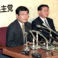 Veteran lawmaker Koichi Kato(center), who died on Friday in Tokyo, talks to reporters after he was appointed as the secretary-general of the Liberal Democratic Party in September 1995. Veteran LDP lawmaker Koichi Kato dies at age 77