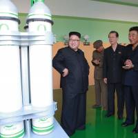 North Korean leader Kim Jong Un tours a new medical oxygen factory in this undated photo released Thursday. LDP groups ask Abe for tougher sanctions on North Korea