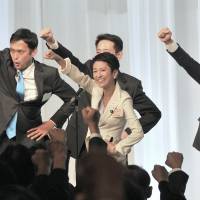 Newly elected Democratic Party leader Renho celebrates her victory following voting by DP lawmakers in Tokyo on Thursday. Party rank and file voted by mail earlier this week. Renho elected leader of main opposition Democratic Party