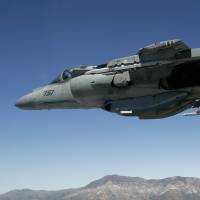 A 2007 file photo shows a U.S. Marine Corps AV-8 Harrier fighter jet on a training flight, the same type of aircraft that crashed Thursday off Okinawa Prefecture. U.S. warplane crashes off Okinawa, prompting fresh safety concerns