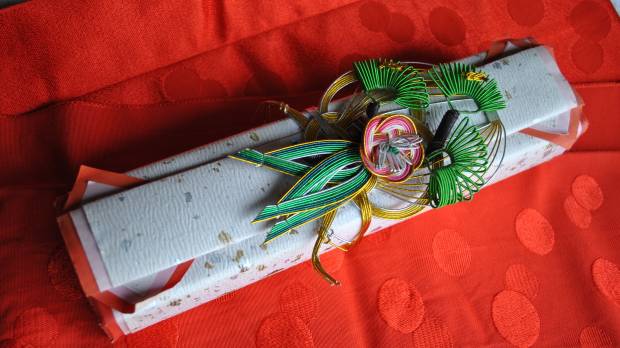 Signed, sealed, delivered: A gift received by the author's neighbor's daughter from the doctor who adopted her. Traditionally on this Seto Inland Sea island, such packages contain a fan (for girls) or a pair of chopsticks (for boys). If you don't feel accepted in Japan, join the far-from-exclusive club