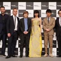 Cast members and the production team of “Invisible Tokyo” pose for a photo. Net TV in Japan: Full stream ahead?