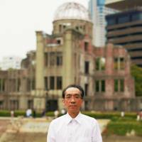 A rebirth: Composer Takashi Niigaki stands in front of the Atomic Bomb Dome in Hiroshima. Takashi Niigaki emerges from the ashes of a scandal with a symphony to call his own