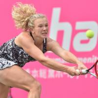 Katerina Siniakova hits a return to Zhang Shuai in the Japan Women's Open semifinals on Saturday at Ariake Colosseum. Siniakova won 6-3, 6-0. Siniakova, McHale advance to Japan Women's Open final