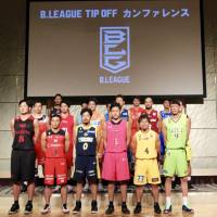 Players from each of the B. League's 18 first-division squads represent their teams during a Sept. 12 preseason media event in Tokyo. B. League ready to begin first-ever season