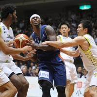 The Sunrockers defense, seen surrounding the B-Corsairs' Jeff Parmer in Saturday's series opener, made a number of key defensive stops in both games and earned a weekend sweep. Sunrockers finish strong to sink B-Corsairs