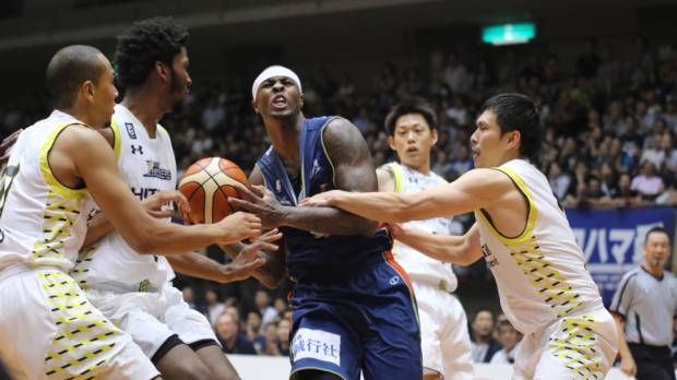 The Sunrockers defense, seen surrounding the B-Corsairs' Jeff Parmer in Saturday's series opener, made a number of key defensive stops in both games and earned a weekend sweep. Sunrockers finish strong to sink B-Corsairs
