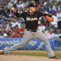 Miami Marlins starting pitcher Jose Fernandez (16) throws against the Chicago Cubs during the first inning at Wrigley Field last month in Chicago. Boat crash claims Marlins ace Jose Fernandez, 24, stunning MLB, Cuban community