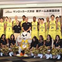 The Sunrockers Shibuya pose at Aoyama Gakuin University, where they will play home games this season. Sunrockers working to meet professional commitments
