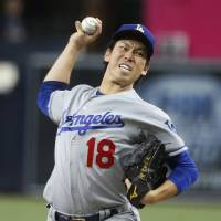 Dodgers starter Kenta Maeda delivers against the Padres on Tuesday in San Diego. Maeda takes loss as Padres rookie Renfroe shows off power