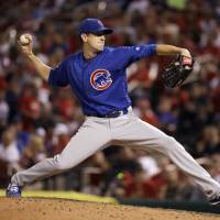 Chicago's Kyle Hendricks pitches against St. Louis in the seventh inning on Monday night. The Cubs beat the Cardinals 4-1. Hendricks loses no-hitter on HR in ninth