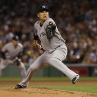 New York starting pitcher Masahiro Tanaka delivers during the Yankees' 7-5 loss to the Red Sox at Fenway Park on Thursday. Tanaka misses milestone as Red Sox overturn Yanks