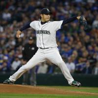Mariners starter Hisashi Iwakuma pitches against the Blue Jays on Tuesday in Seattle. Toronto defeated Seattle 10-2. Blue Jays pounce on Mariners hurler Iwakuma