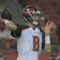 Tampa Bay QB Mike Glennon throws a pass against Washington in preseason action on Wednesday night. The Redskins beat the Buccaneers 20-13. Brown, Redskins beat Bucs in rain
