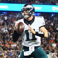 Eagles quarterback Carson Wentz prepares to pass during his team's game against the Bears on Monday in Chicago. The Eagles won 29-14. Wentz shines again as Eagles beat Bears