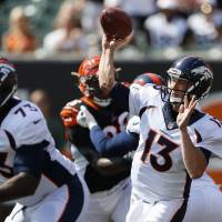 Broncos quarterback Trevor Siemian passes against the Bengals during their game on Sunday in Cincinnati. Siemian's big day sends Broncos past Bengals