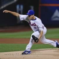 New York starter Seth Lugo delivers during the Mets' 3-2 win over the Twins on Saturday. Granderson powers Mets