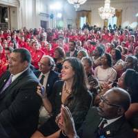 The families of 1936 Summer Olympians (foreground), including the family of four-time Olympic gold medalist Jesse Owens, are recognized as they sit in the audience in the East Room of the White House in Washington on Thursday. During a ceremony, President Barack Obama also honored the 2016 U.S. Olympic and Paralympic Teams. Obama welcomes relatives of 1936 African-American Olympians at White House