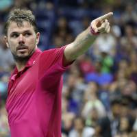 Stan Wawrinka celebrates after beating Juan Martin del Potro in the quarterfinals of the U.S. Open in New York on Wednesday. Wawrinka beats emotional del Potro to reach semis