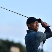 Tiger Woods, seen in a July 2015 file photo, underwent back surgery last October. Tiger hoping to return to competition next month