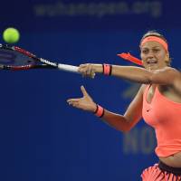 Petra Kvitova hits a return during her semifinal match against Simona Halep at the Wuhan Open on Friday. Kvitova whips Halep to book spot in Wuhan Open final