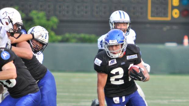 IBM running back Ryo Takagi scores the go-ahead touchdown on a 37-yard run in the fourth quarter against Asahi Beer in the X League on Sunday. BigBlue hold off Silver Star in thriller