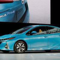 A Toyota Prius Prime appears at a media preview of the 2016 New York International Auto Show in March. Toyota expands battery options with safer lithium-ion devices