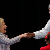 Democratic presidential candidate Hillary Clinton greets an audience member as she takes the stage for a campaign stop on Friday in Fort Pierce, Florida. Hackers targeted election systems of 20 U.S. states, Homeland Security official says