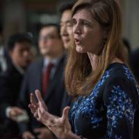 U.S. Ambassador to the U.N. Samantha Power holds a “doorstep” session with the media following her meeting with South Korea’s foreign minister, Yun Byung-se, at the foreign ministry in Seoul on Monday. U.S. demands harsh resolution against North Korea as China marks Pyongyang party's 71st year