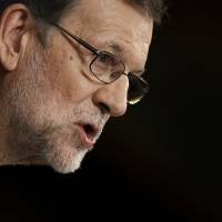 Spain’s Prime Minister Mariano Rajoy gives a speech in parliament in Madrid on Saturday. Spain ends 10-month political crisis