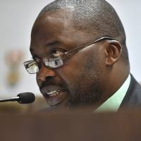 South Africa’s minister of justice and correctional services, Michael Masutha, speaks to the press in Pretoria, South Africa, on Friday. Masutha said South Africa will soon submit a bill in parliament to withdraw from the International Criminal Court making the country the second this week, after Burundi, to move to leave the tribunal that pursues the world’s worst atrocities. South Africa's withdrawal rocks International Criminal Court