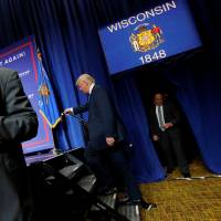 Republican U.S. presidential nominee Donald Trump holds a campaign rally in Green Bay, Wisconsin, on Monday. As Trump bashed China, he sought deals with its government