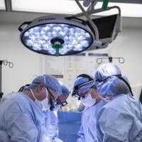 Surgeons perform a uterine transplant during a September clinical trial at the Baylor University Medical Center at Dallas. On Wednesday, the hospital said four women who had been born without a uterus received one in operations in September. Three of the wombs have had to be removed because of poor blood flow, but a hospital statement says the fourth recipient still has hers and is showing no signs of rejection. Dallas hospital performs four uterus transplants from live donors; three fail