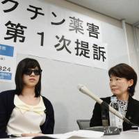 A high school student from Nara Prefecture talks about the alleged side effects of a cervical cancer vaccine after filing a group lawsuit against the government and drugmakers in Osaka in July. Lawsuit over cervical cancer vaccines to drag on as health ministry fights on