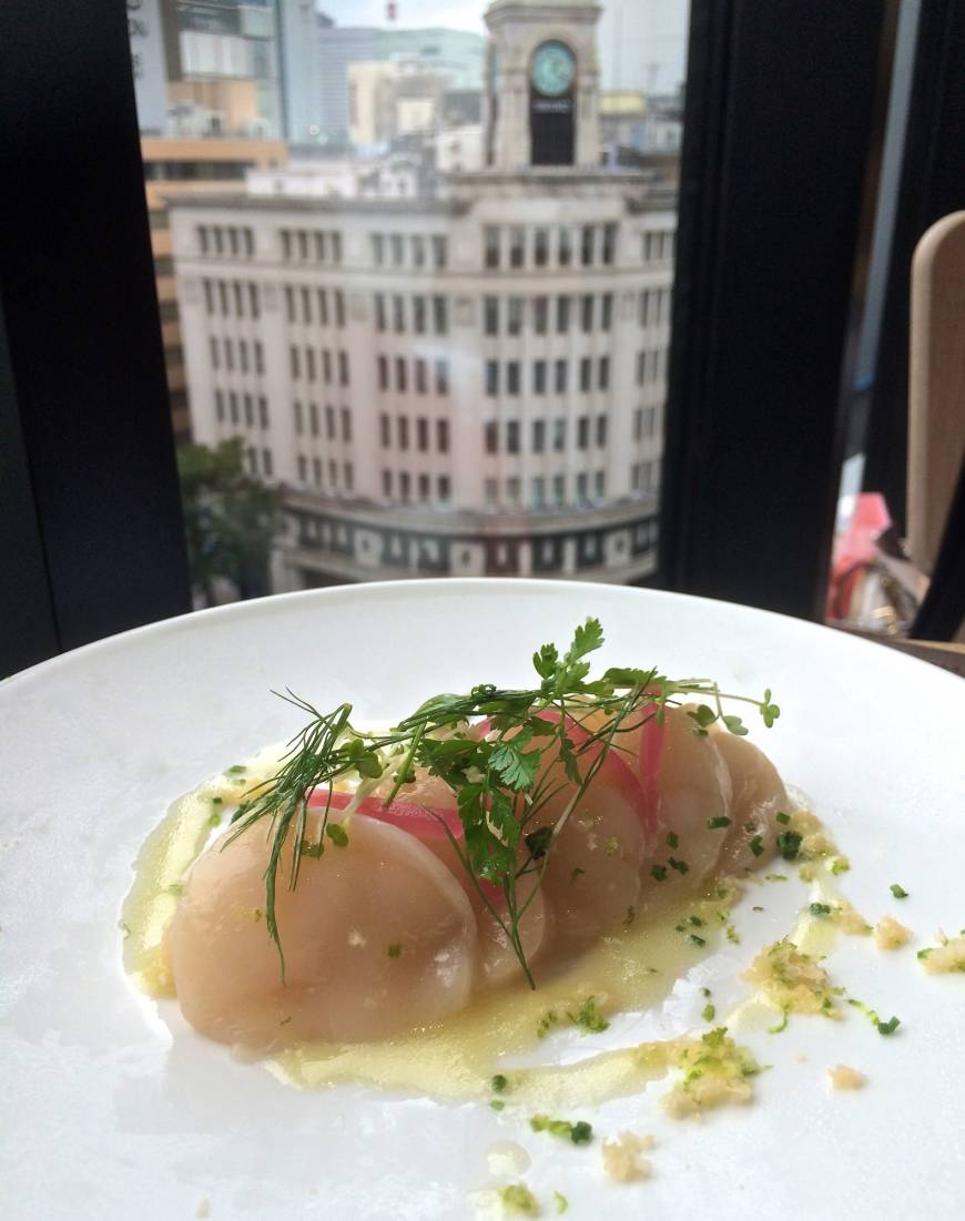 Bistro Marx Dining room with a view: A starter of finely sliced raw scallops rests on a bed of couscous at Bistro Marx, in the new Ginza Place building. | ROBBIE SWINNERTON