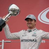 Mercedes driver Nico Rosberg celebrates his Japanese Grand Prix victory at the Suzuka Circuit on Sunday. Title-chasing Rosberg triumphs in Japanese Grand Prix