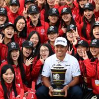 Hideki Matsuyama poses with the winner’s trophy after the final round of the HSBC Champions on Sunday in Shanghai. Matsuyama dominates in Shanghai for third PGA tour title