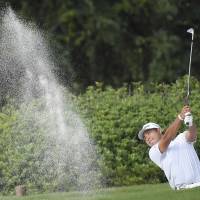 Hideki Matsuyama plays out of a bunker at the HSBC Champions in Shanghai on Sunday. Matsuyama sets sights on major